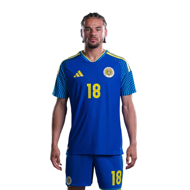 Jersey di Kopa Mundial 2026 Selekshon Nashonal di Futbòl Kòrsou (Vershon di Hungadó/Vershon di Partido) —Defensornan: No.5 Sherel FLORANUS, No.18 Armando BISHOP, No.20 Joshua BRENET