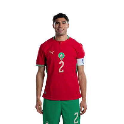 قميص المنتخب المغربي لكرة القدم لكأس العالم 2026 (نسخة اللاعبين/نسخة المباريات) — المدافعون: رقم 2 أشرف حكيمي، رقم 3 نصير مزراوي، رقم 5 مروان سعدان.
